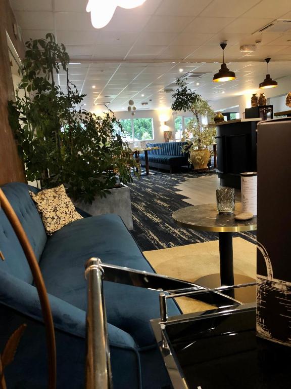 Posezení v ubytování Artémis Hôtel & Spa Bistro Coquet