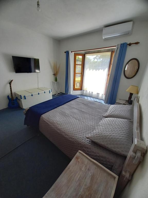 Katil atau katil-katil dalam bilik di Casa Del mar al mundo