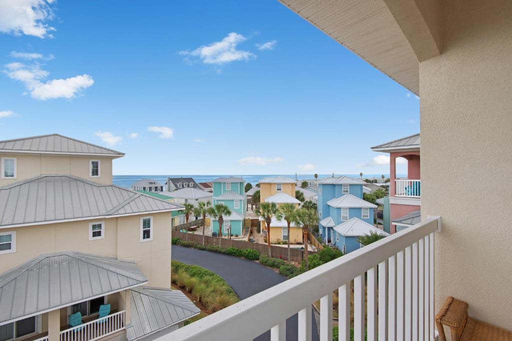 a balcony with a view of a town at Emerald Coast Cabana in Panama City Beach