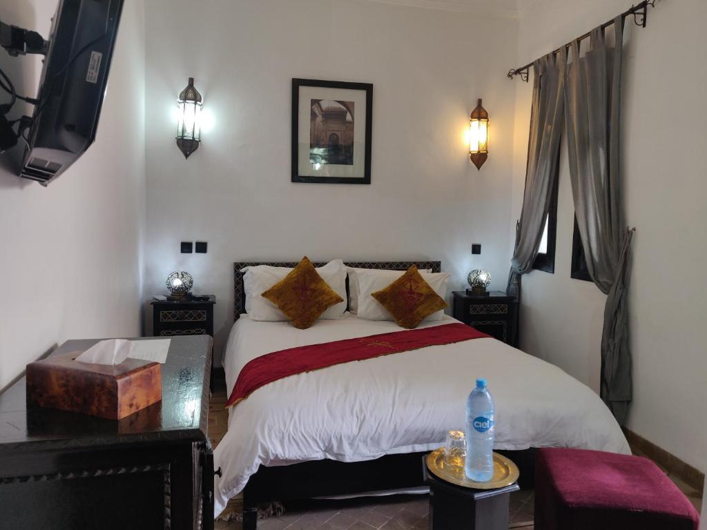 Postel nebo postele na pokoji v ubytování Riad Dar Foundouk and Spa