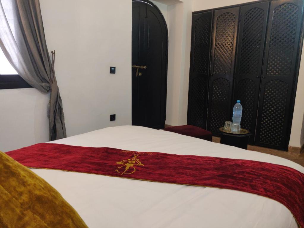 Postel nebo postele na pokoji v ubytování Riad Dar Foundouk and Spa