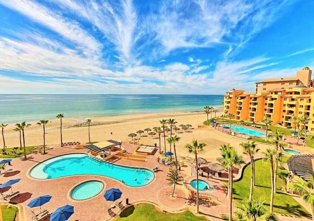 an aerial view of a resort and the beach at Right on the Beach! Rocky Point Condo Rental - 2 Bedroom Penthouse Beachfront in Puerto Peñasco