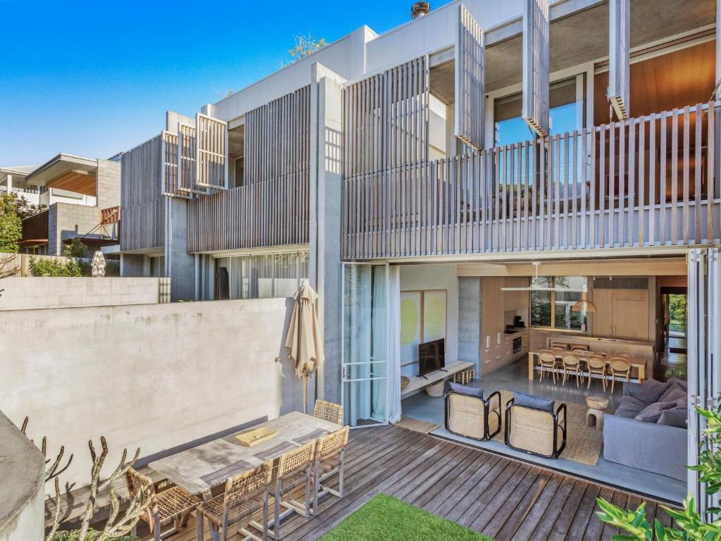 an exterior view of a house with a deck at Driftwood Two at Clarkes Beach in Byron Bay