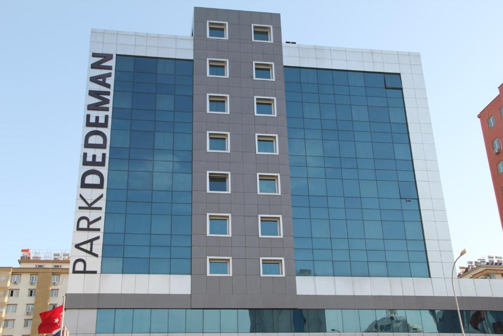 a building with a sign on the side of it at Dedeman Park Gaziantep City Center in Gaziantep