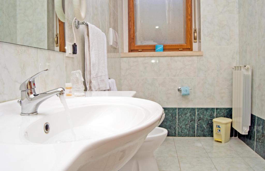 Koupelna v ubytování Hotel California