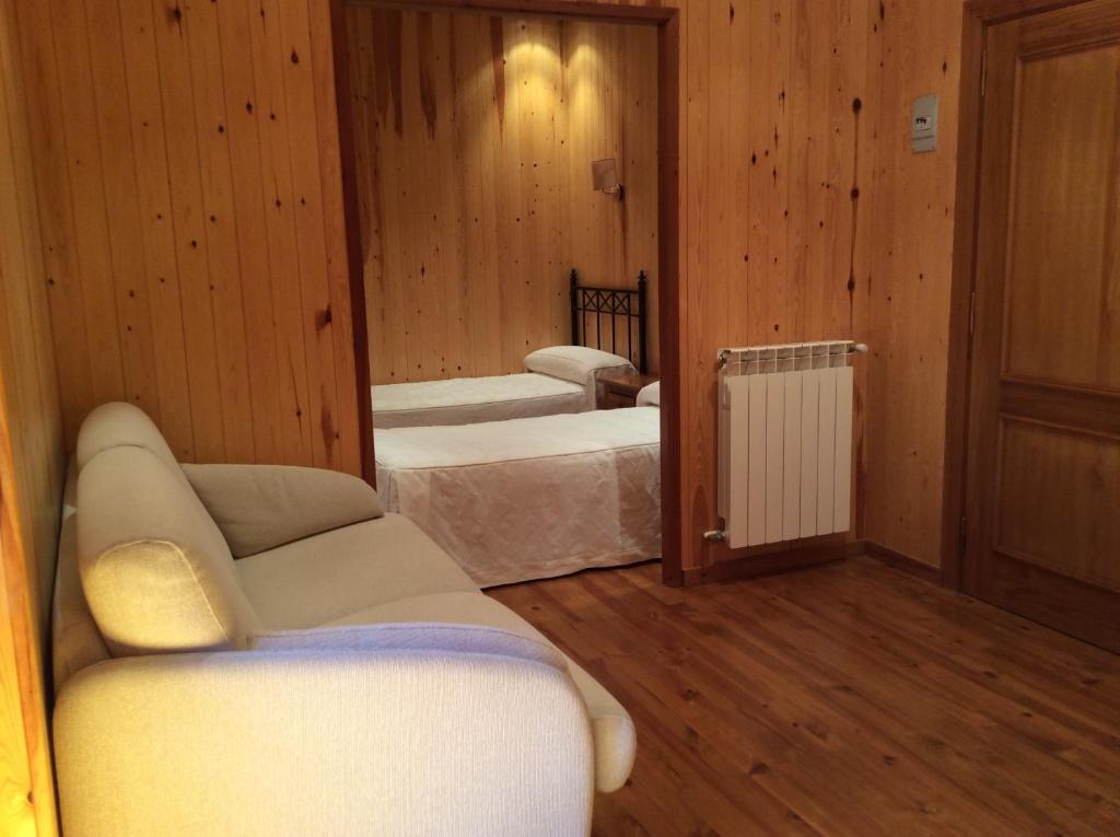 Postel nebo postele na pokoji v ubytování Hotel La Ribera