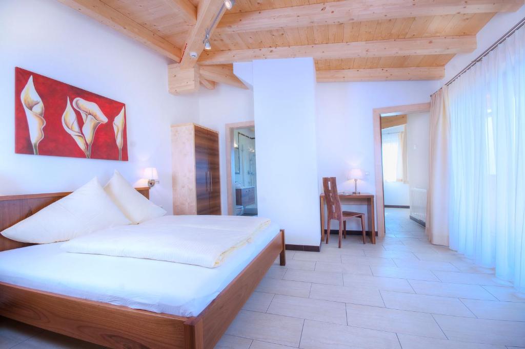 Postel nebo postele na pokoji v ubytování Panoramahotel Burgeck