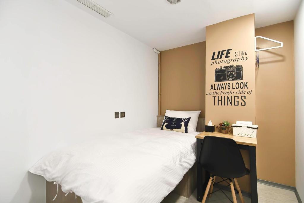 Postel nebo postele na pokoji v ubytování Flyinn Hostel