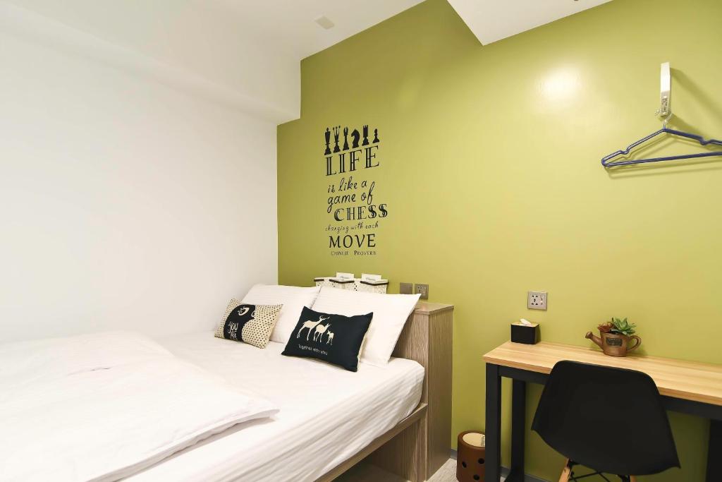 Postel nebo postele na pokoji v ubytování Flyinn Hostel