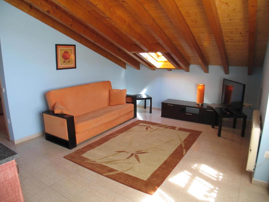 A seating area at Apartamentos Las Rosas