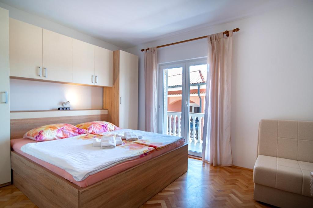 Кровать или кровати в номере Kastell Apartments