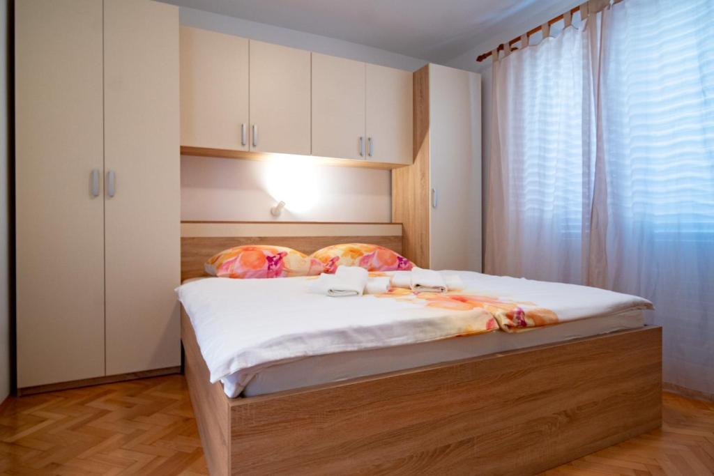 Кровать или кровати в номере Kastell Apartments
