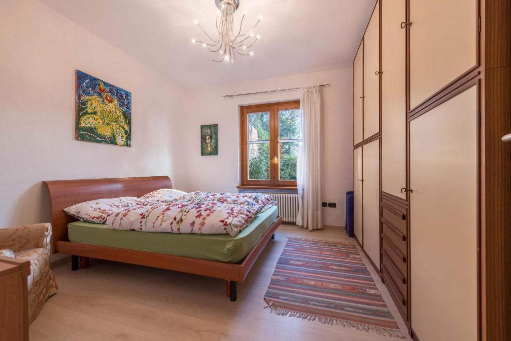 Posteľ alebo postele v izbe v ubytovaní Ferienwohnung Gardasee Castion