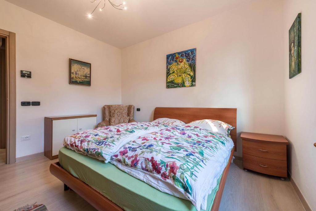 Posteľ alebo postele v izbe v ubytovaní Ferienwohnung Gardasee Castion