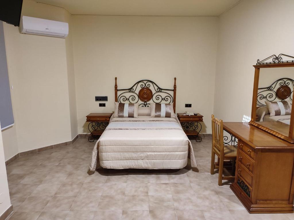 Posteľ alebo postele v izbe v ubytovaní Hotel Novo