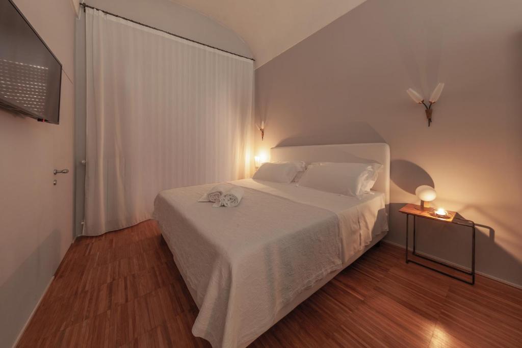 Postel nebo postele na pokoji v ubytování Lidia Chambres D'hotes