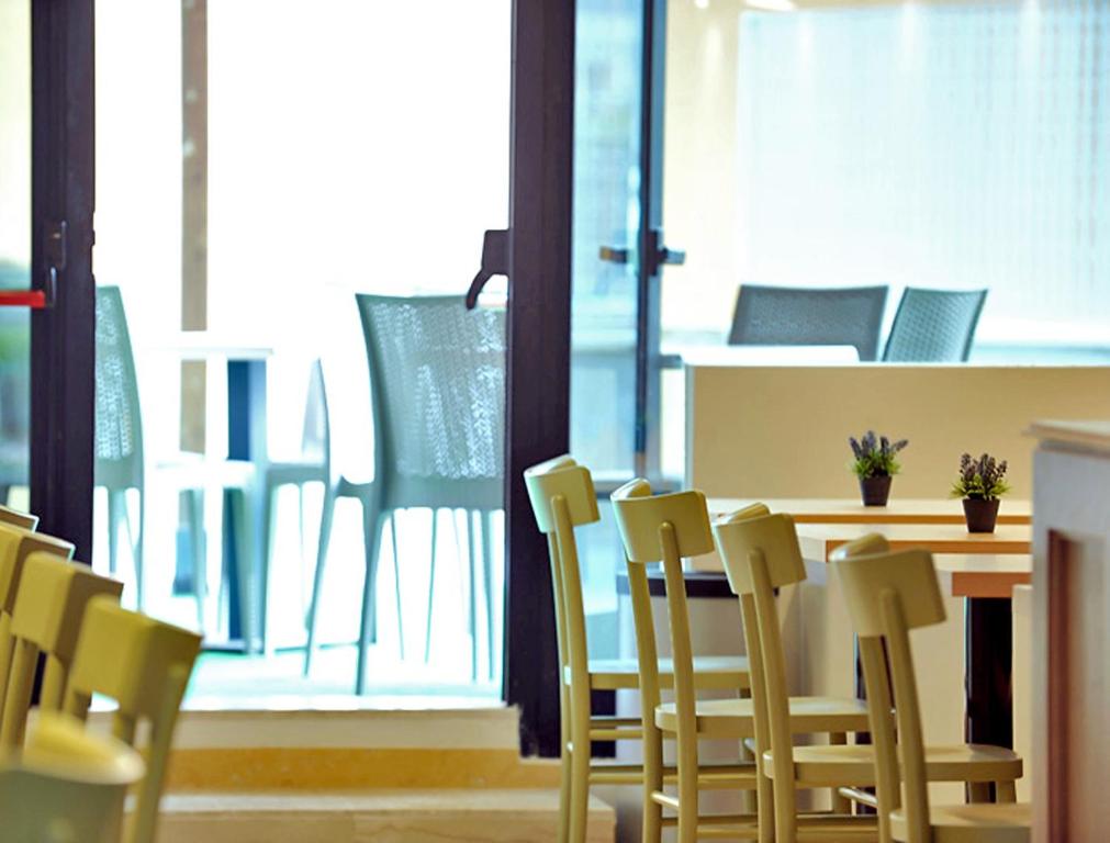 Posezení v ubytování Hotel Ambassador