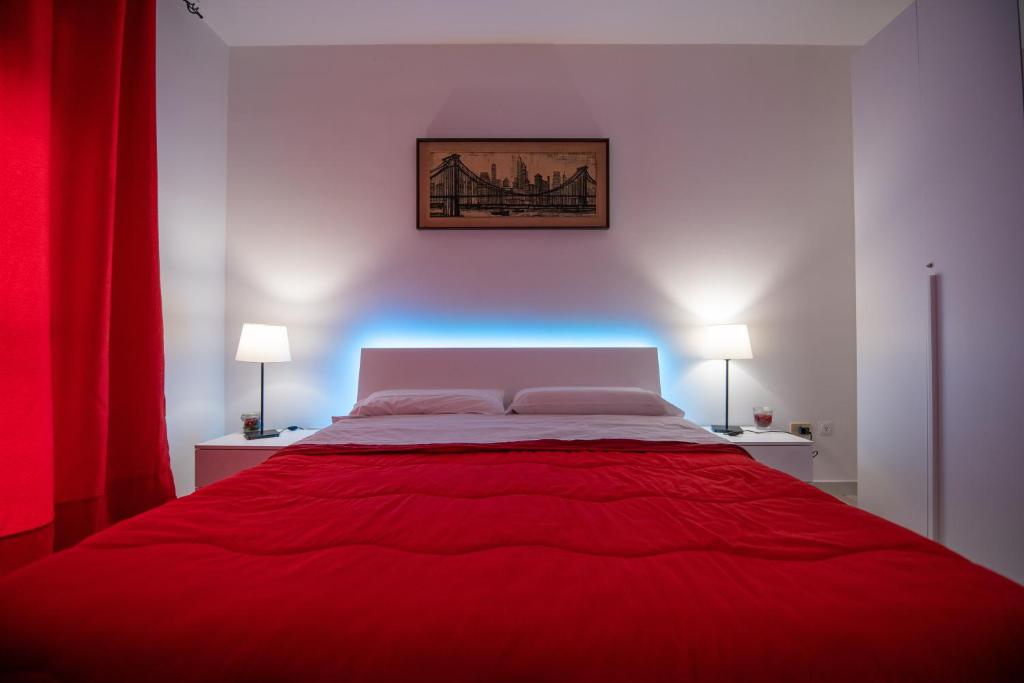 מיטה או מיטות בחדר ב-B&B A casa di Amici
