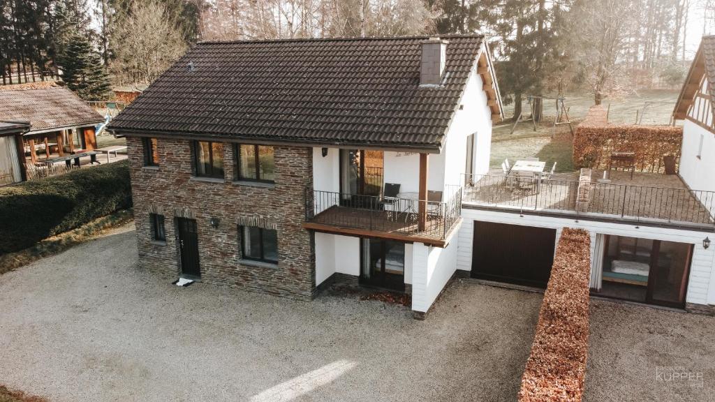 an aerial view of a house with a balcony at La Trientale 10 pers -Malmedy in Xhoffraix