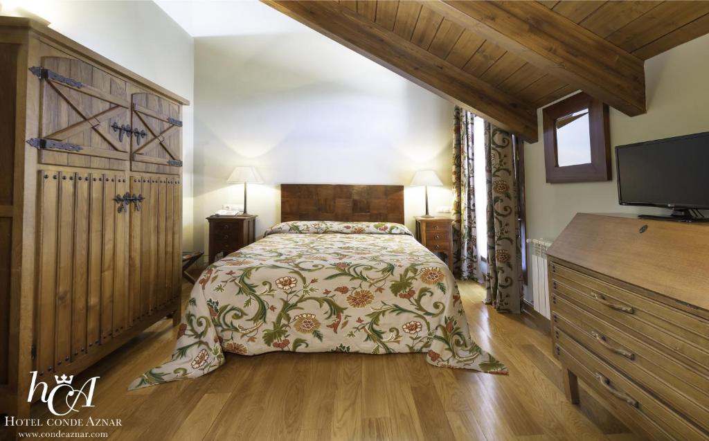 Ένα ή περισσότερα κρεβάτια σε δωμάτιο στο Conde Aznar