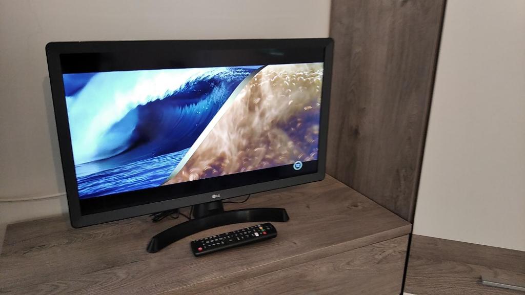TV a/nebo společenská místnost v ubytování Hostel Maros