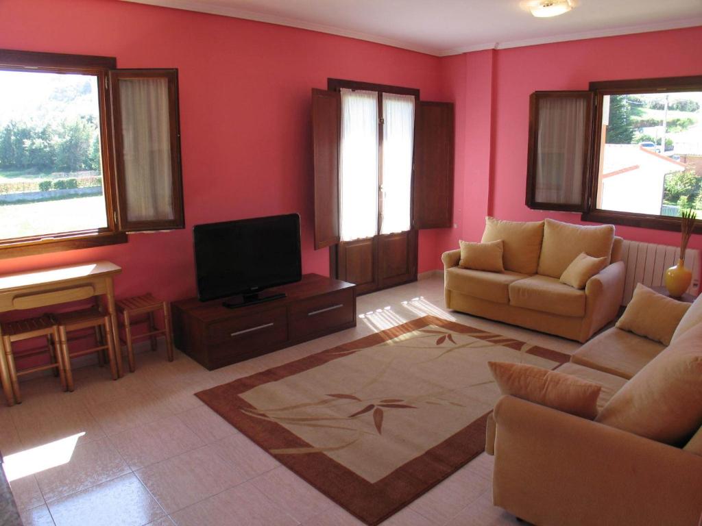 A seating area at Apartamentos Las Rosas
