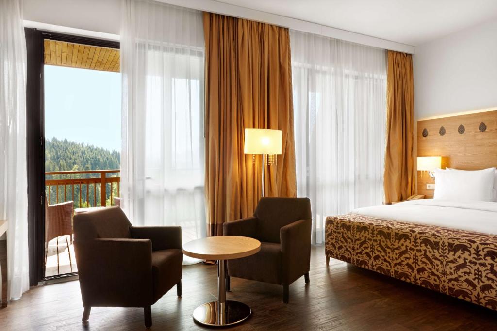 Postel nebo postele na pokoji v ubytování Radisson Blu Resort Bukovel
