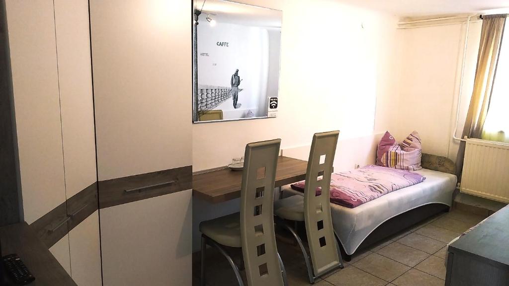 Postel nebo postele na pokoji v ubytování Hostel Maros