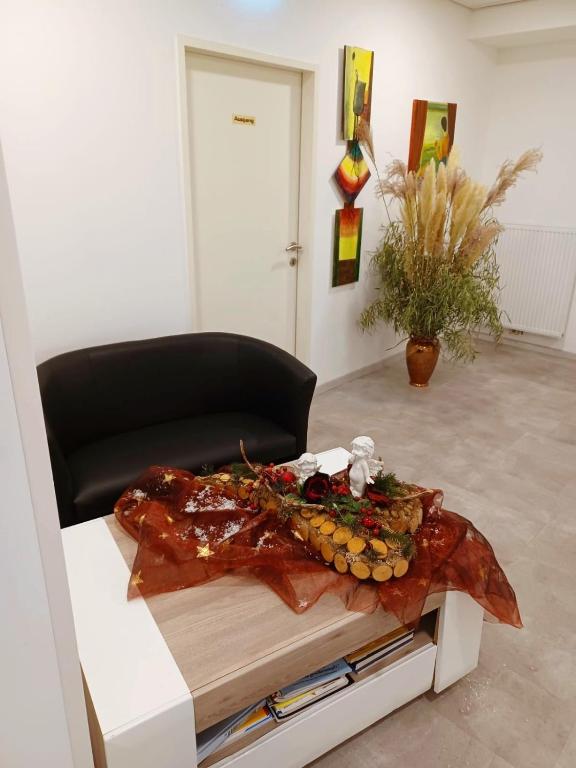 a table in a room with a table with food on it at Pension Waldesruh in Linz