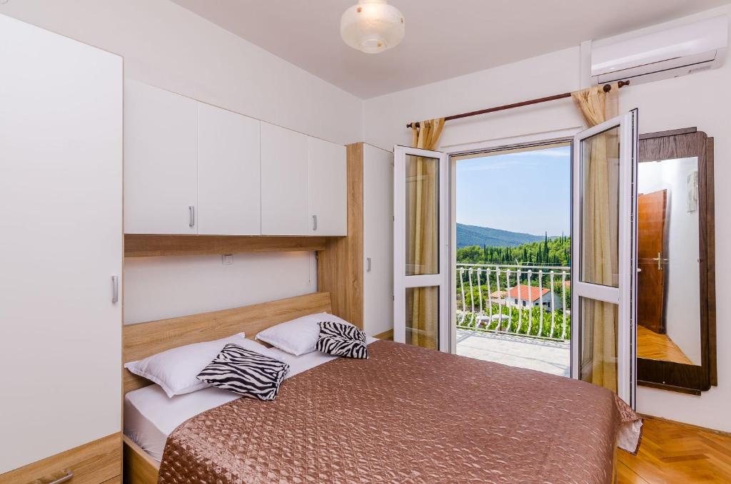 Posteľ alebo postele v izbe v ubytovaní Villa Dalmatian Gem