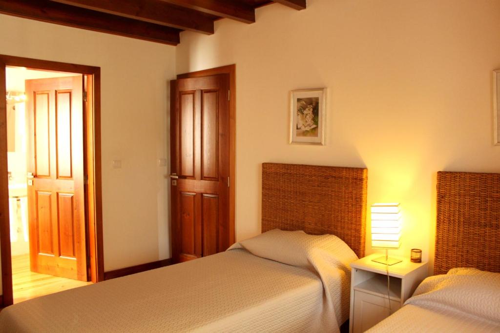 Uma cama ou camas num quarto em Quinta Dos Anjos