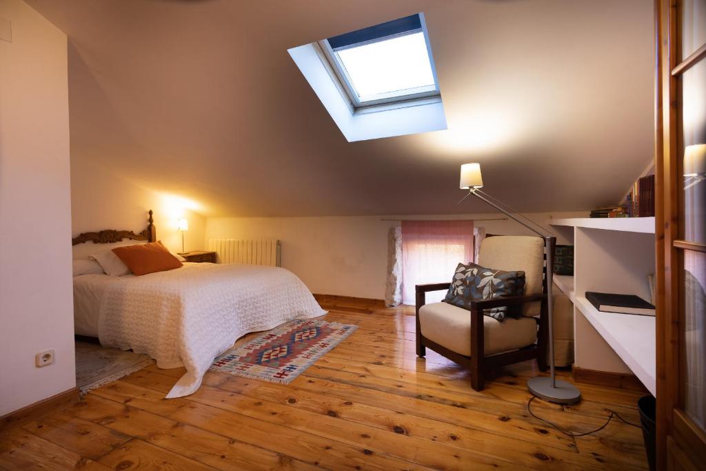 Postel nebo postele na pokoji v ubytování Casa Rural La Moderna