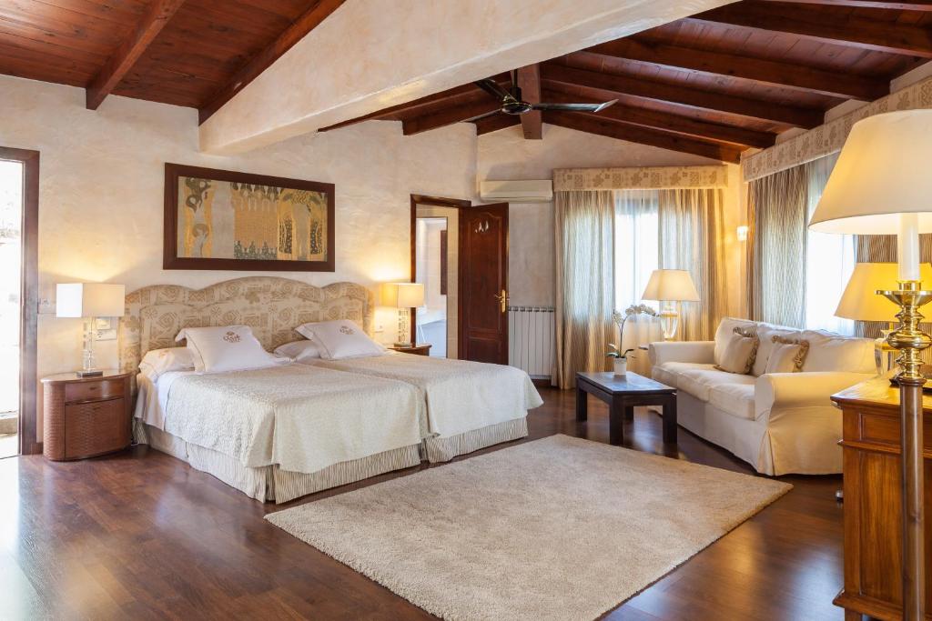 Postel nebo postele na pokoji v ubytování Hotel Rural Cas Pla