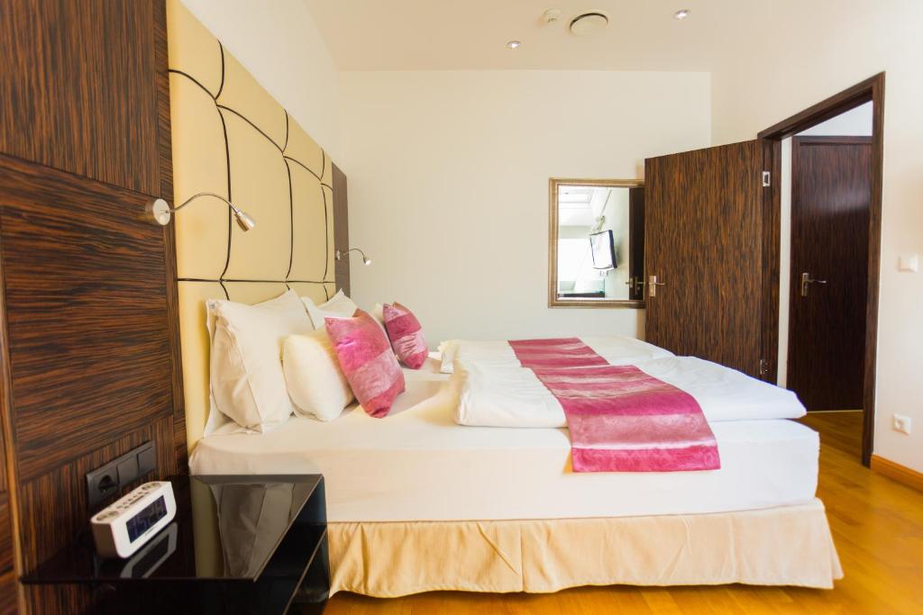 Postel nebo postele na pokoji v ubytování Best Western Plus Hotel Arcadia