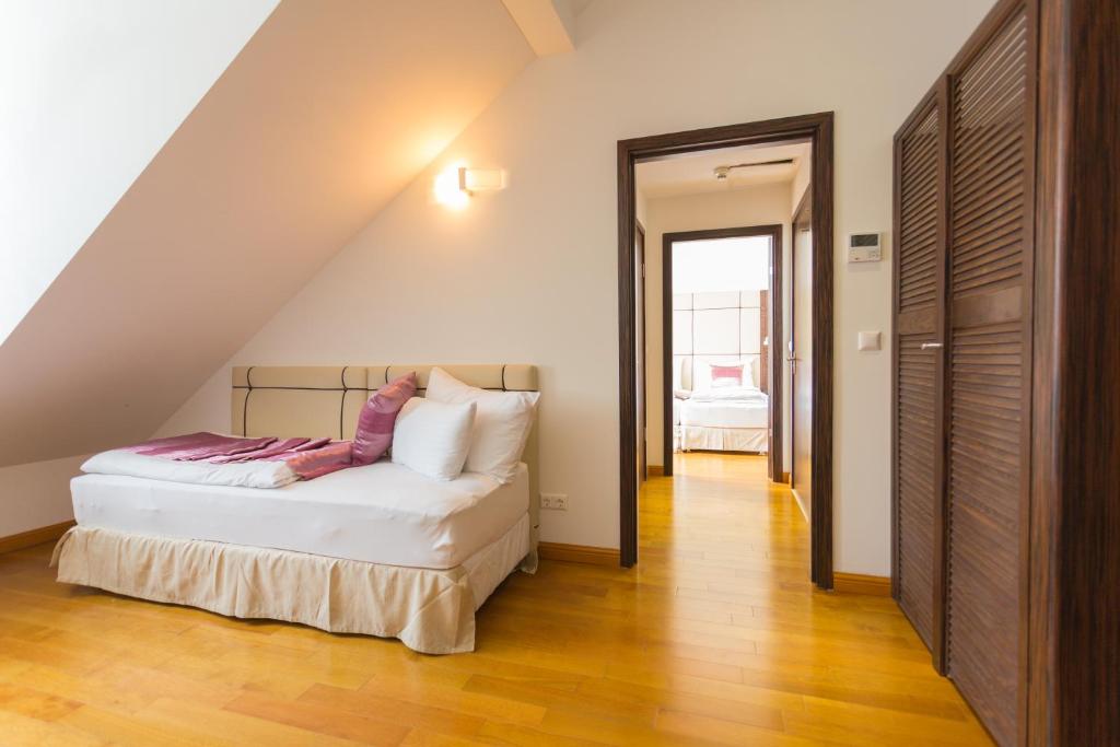 Postel nebo postele na pokoji v ubytování Best Western Plus Hotel Arcadia