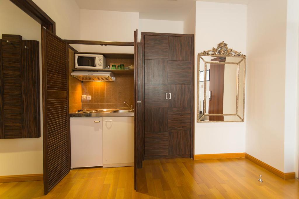 Kuchyň nebo kuchyňský kout v ubytování Best Western Plus Hotel Arcadia