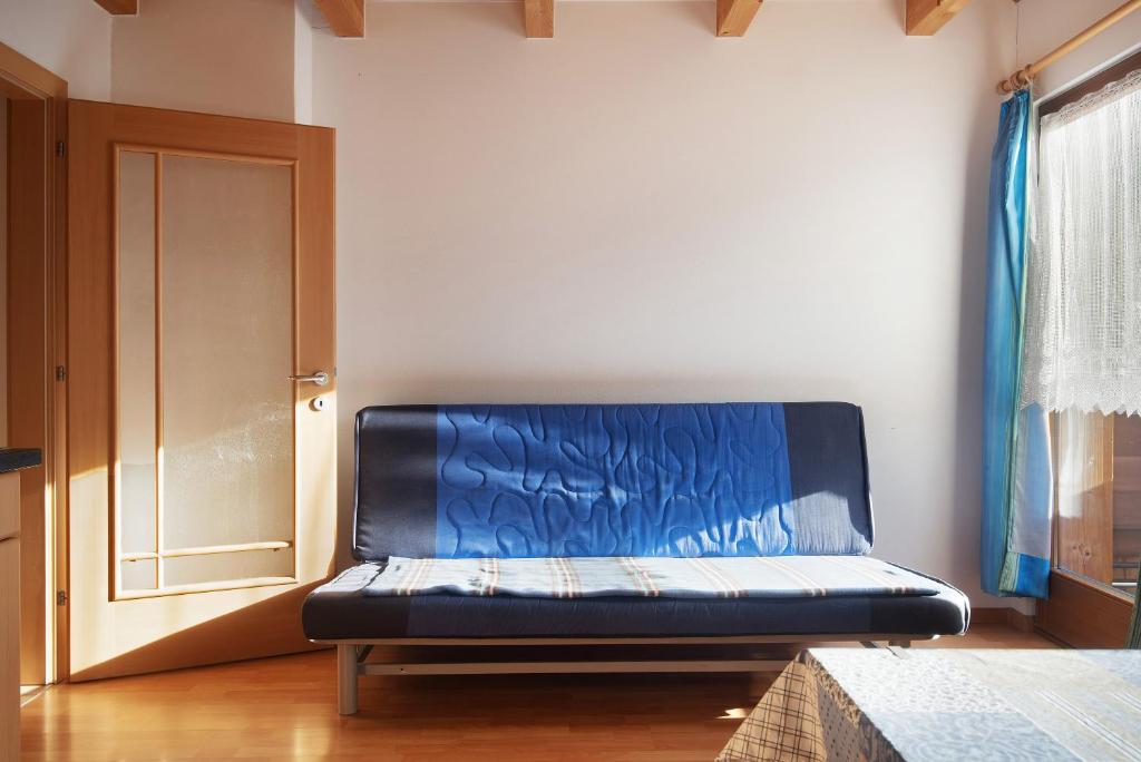 A bed or beds in a room at Apt Talblick Hinterproslhof