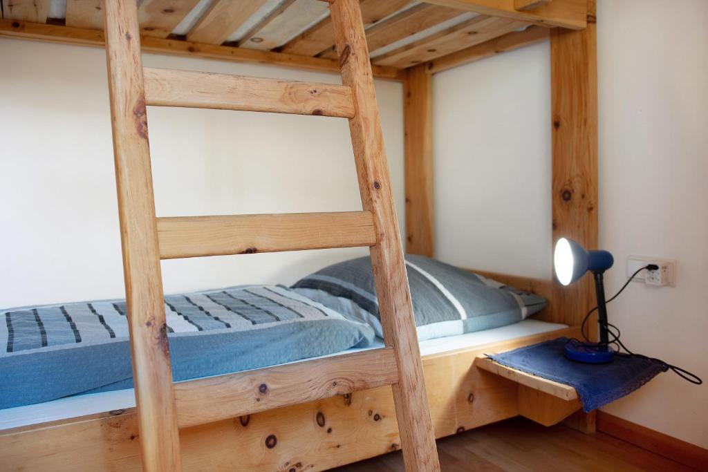 A bed or beds in a room at Apt Talblick Hinterproslhof
