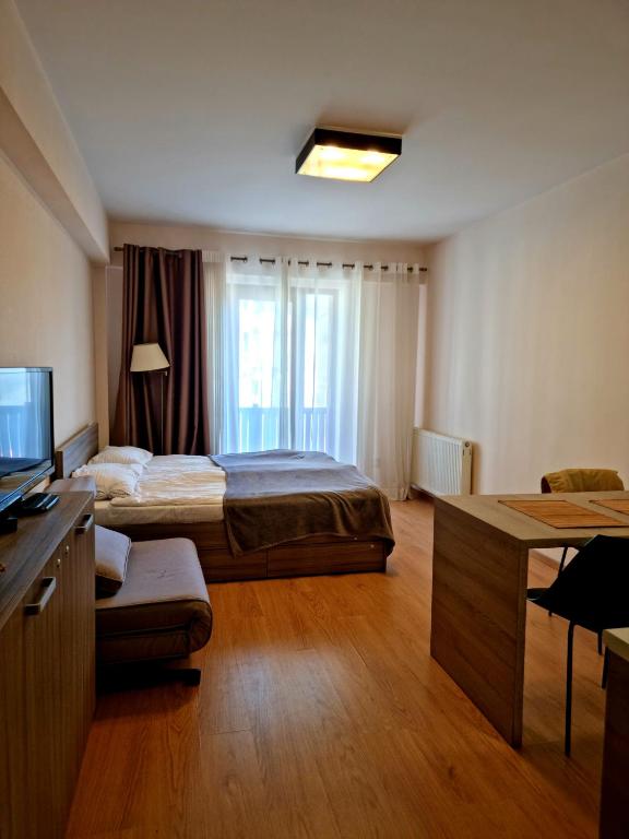 Postel nebo postele na pokoji v ubytování New Gudauri Studio