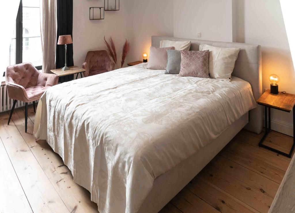 Postel nebo postele na pokoji v ubytování B&B landhuis Hauwaart 80