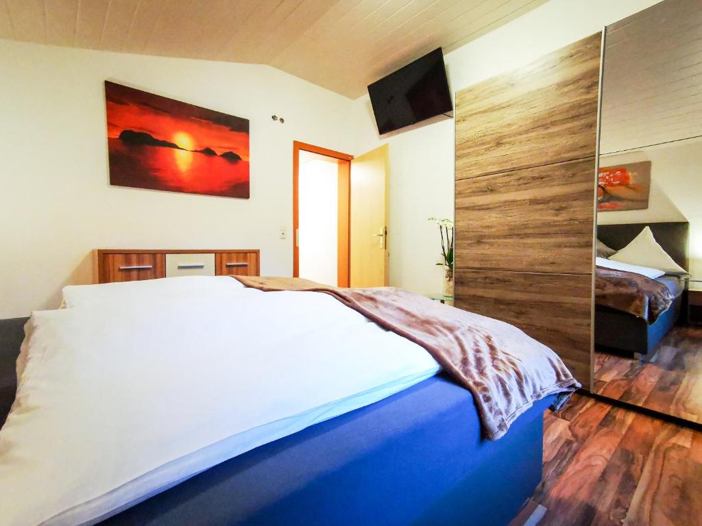 Postel nebo postele na pokoji v ubytování Alpenchalet Dona