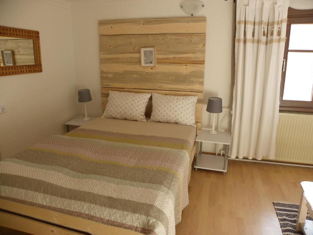 Postel nebo postele na pokoji v ubytování InGreen house