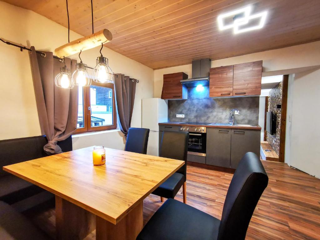 Kuchyň nebo kuchyňský kout v ubytování Alpenchalet Dona