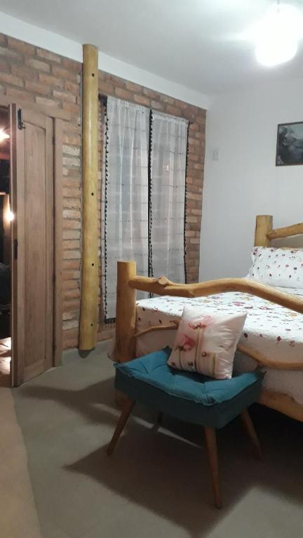 Postel nebo postele na pokoji v ubytování Casa dos Sonhos Hospedaria