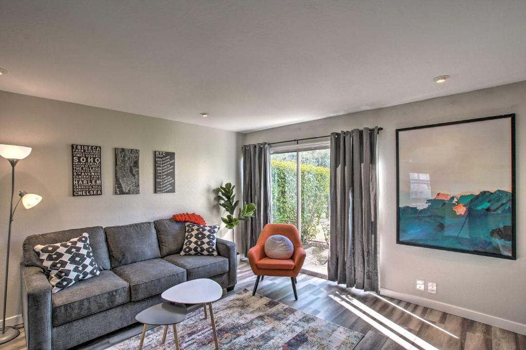 a living room with a couch and a chair at Condo 1 Mi to Old Town Scottsdale and Golfing in Scottsdale