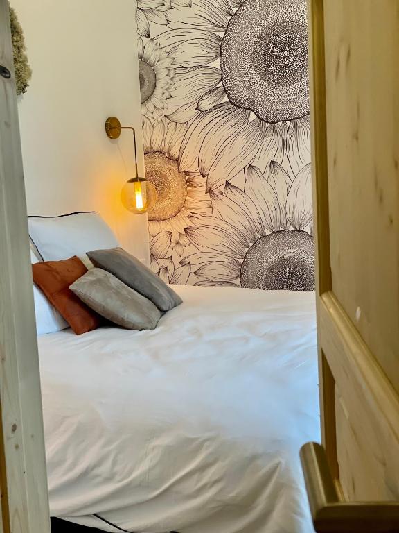 Postel nebo postele na pokoji v ubytování Chez Brunet chambres d'hôtes et gîte