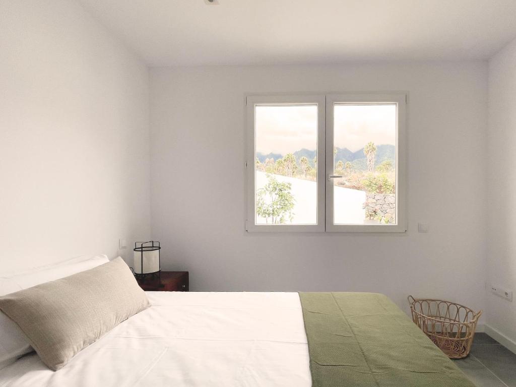 A bed or beds in a room at ''LA GRAMA II'', comodidad y excelente ubicación