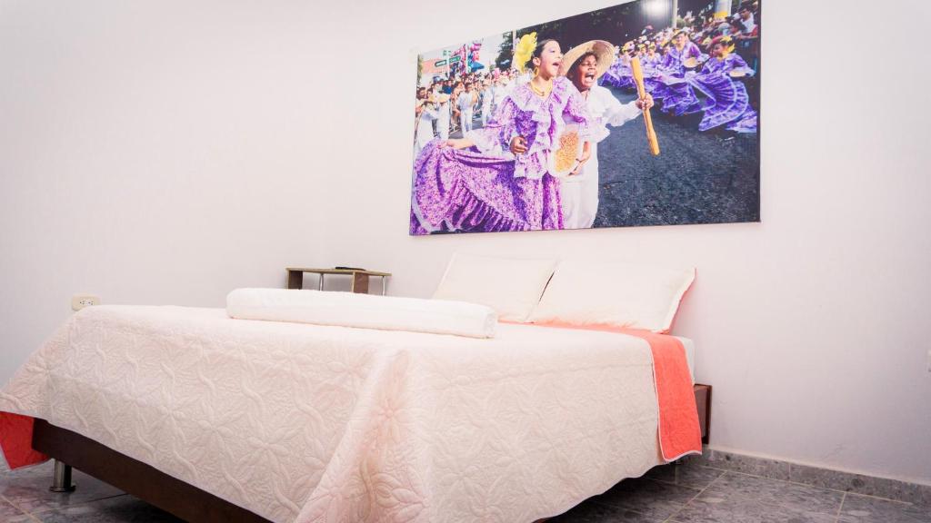 Postel nebo postele na pokoji v ubytování Hotel Casa Martina Valledupar