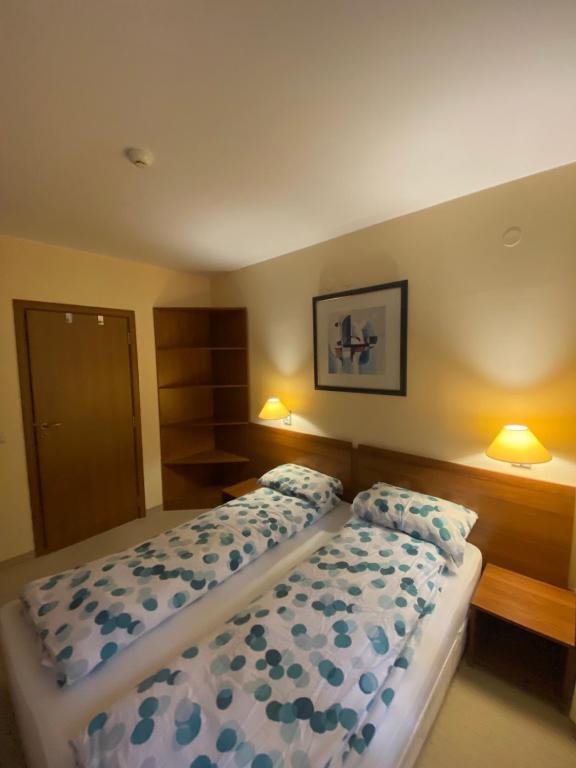 Postel nebo postele na pokoji v ubytování HQ apartments Villa Park