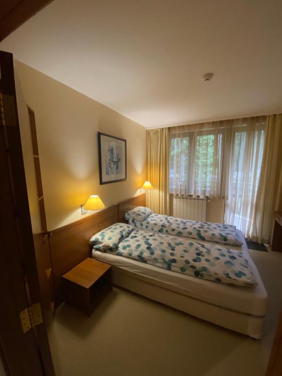 Postel nebo postele na pokoji v ubytování HQ apartments Villa Park